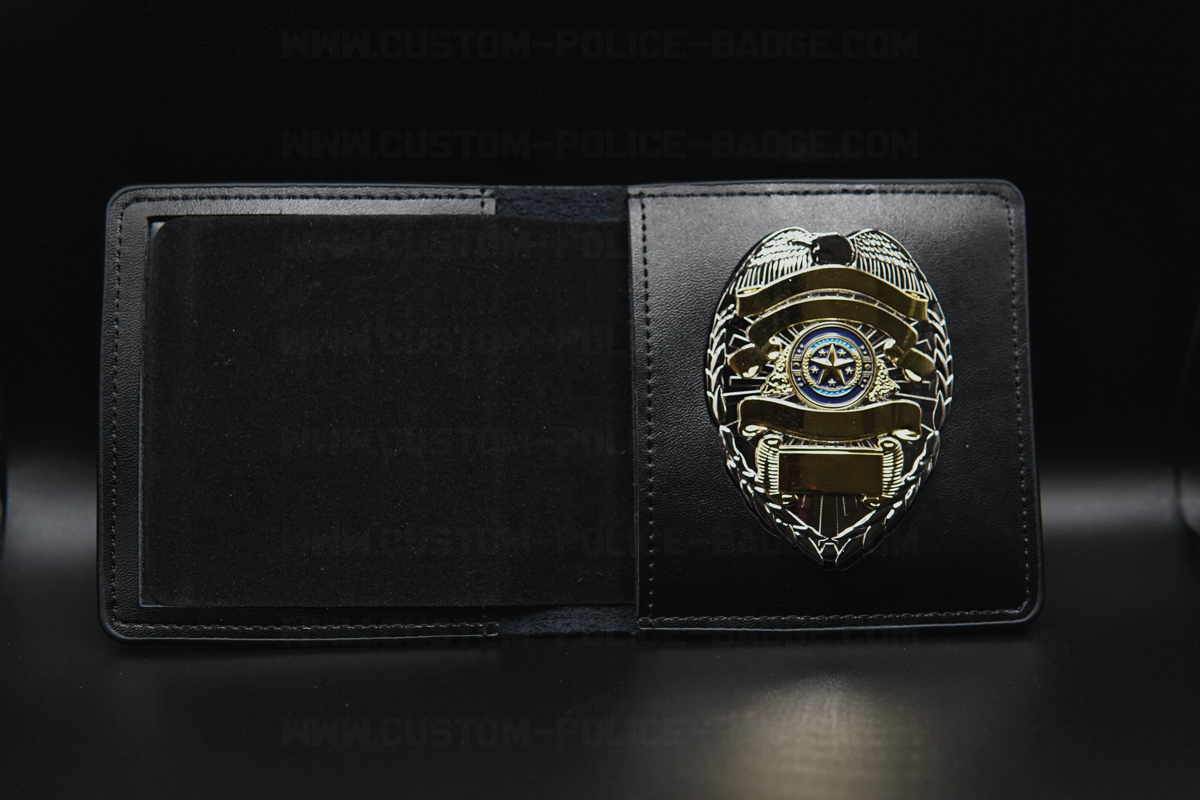 Open leather badge wallet with an engraved police badge mounted on the right
