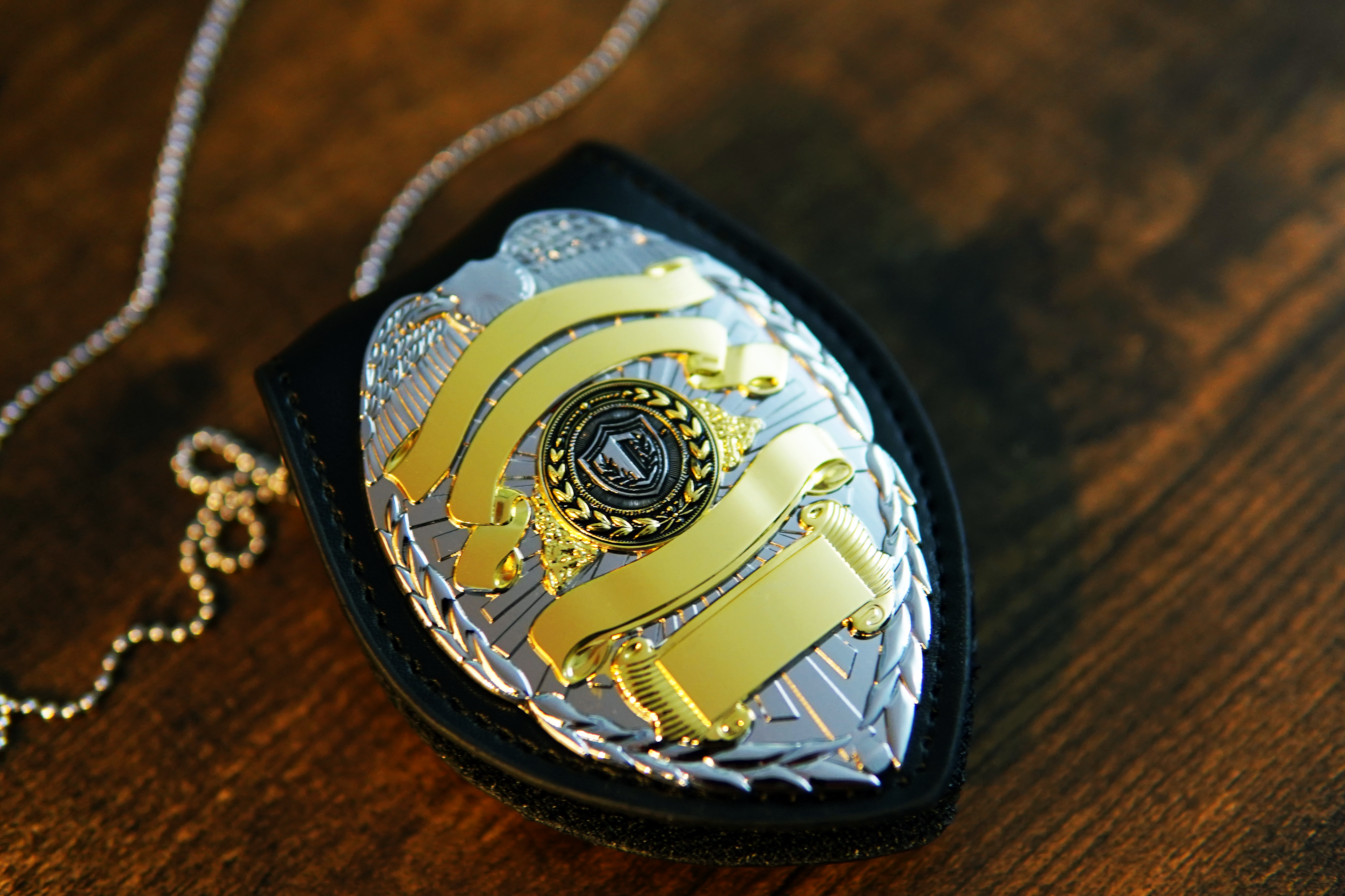 Silver and gold engraved police badge with ribbon plates for custom text